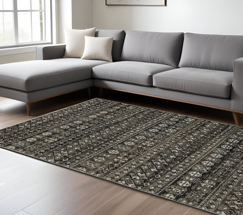 7' X 10' Black And Gray Tribal Area Rug With Fringe