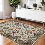 4' X 6' Ivory And Green Oriental Area Rug With Fringe