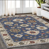 5' X 8' Blue And Ivory Floral Area Rug With Fringe
