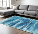 8' X 10' Sky Blue And Ivory Abstract Distressed Area Rug
