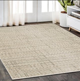 5' X 8' Beige And Brown Geometric Area Rug With Fringe