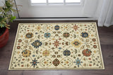2' X 3' Ivory And Gold Oriental Area Rug With Fringe