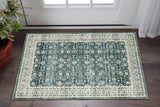 2' X 3' Teal And Ivory Oriental Distressed Area Rug