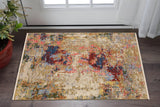 2' X 3' Beige Red And Blue Abstract Area Rug With Fringe