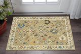 3' X 5' Beige Dark Orange And Blue Oriental Area Rug With Fringe