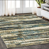 5' X 8' Beige And Blue Abstract Area Rug