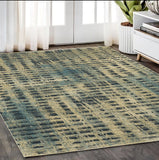 5' X 8' Beige And Blue Geometric Area Rug