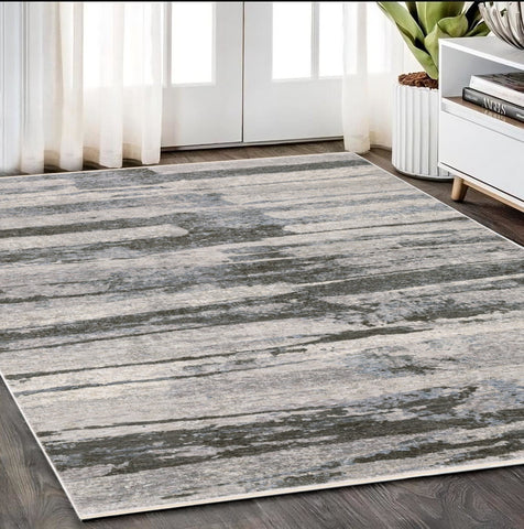 5' X 8' Gray And Ivory Abstract Area Rug With Fringe
