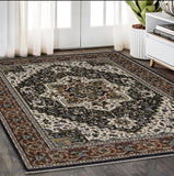 5' X 8' Navy Blue Black And Tan Medallion Area Rug With Fringe