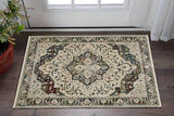 3' X 5' Beige Rust And Blue Medallion Area Rug With Fringe