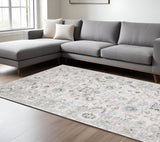 6' X 9' Ivory And Teal Blue Oriental Hand Tufted Area Rug