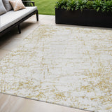5' X 8' Gold And Ivory Abstract Washable Indoor Outdoor Area Rug