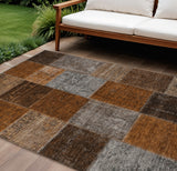 8' X 10' Orange And Taupe Patchwork Washable Indoor Outdoor Area Rug