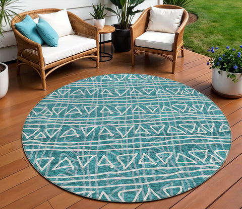 8' Teal Blue And Ivory Round Geometric Washable Indoor Outdoor Area Rug