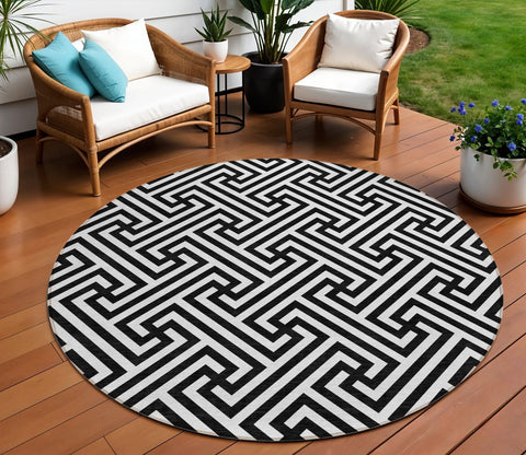 8' Black And Ivory Round Geometric Washable Indoor Outdoor Area Rug