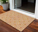 3' X 5' Orange And Ivory Geometric Washable Indoor Outdoor Area Rug