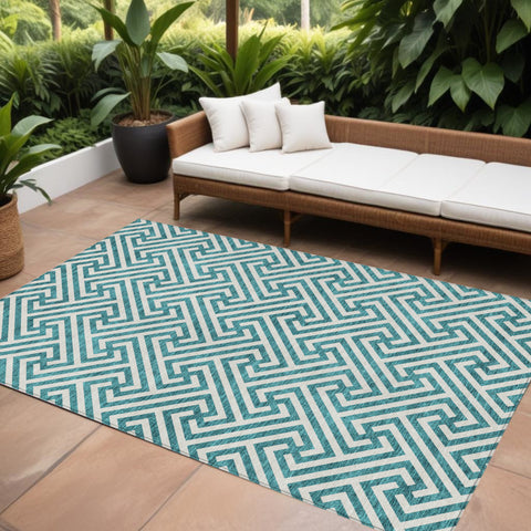 8' X 10' Teal Blue And Ivory Geometric Washable Indoor Outdoor Area Rug