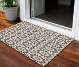 3' X 5' Brown Beige And Ivory Floral Medallion Washable Indoor Outdoor Area Rug