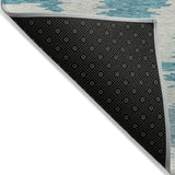 5' X 8' Teal Blue Aqua And Ivory Abstract Washable Indoor Outdoor Area Rug