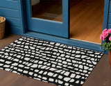 3' X 5' Black And Ivory Abstract Washable Indoor Outdoor Area Rug