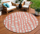 8' Salmon And Ivory Round Abstract Washable Indoor Outdoor Area Rug