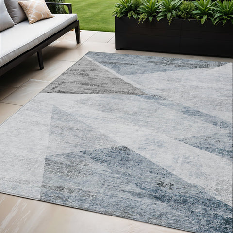 5' X 8' Sky Blue Gray And Charcoal Abstract Washable Indoor Outdoor Area Rug