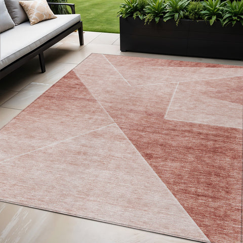 5' X 8' Salmon And Ivory Abstract Washable Indoor Outdoor Area Rug