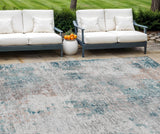 8' X 10' Teal Blue Beige And Copper Abstract Washable Indoor Outdoor Area Rug