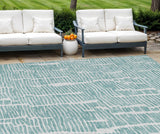 8' X 10' Teal Blue And Ivory Abstract Washable Indoor Outdoor Area Rug