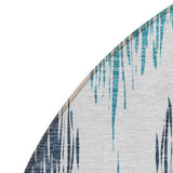 8' Teal Blue And Ivory Round Ikat Washable Indoor Outdoor Area Rug