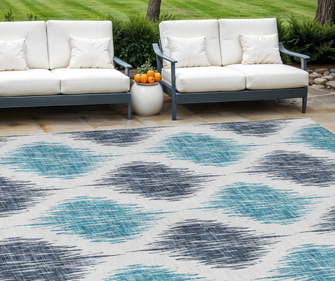 8' X 10' Teal Blue And Ivory Ikat Washable Indoor Outdoor Area Rug
