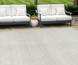 8' X 10' Ivory And Beige Striped Washable Indoor Outdoor Area Rug