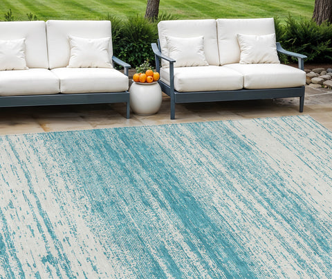 8' X 10' Teal Blue And Ivory Striped Washable Indoor Outdoor Area Rug