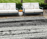8' X 10' Black And Ivory Striped Washable Indoor Outdoor Area Rug