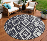 8' Black And Ivory Round Geometric Washable Indoor Outdoor Area Rug