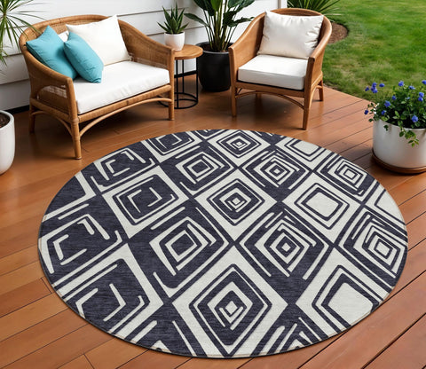 8' Black And Ivory Round Geometric Washable Indoor Outdoor Area Rug