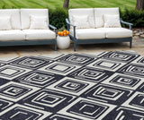 8' X 10' Black And Ivory Geometric Washable Indoor Outdoor Area Rug