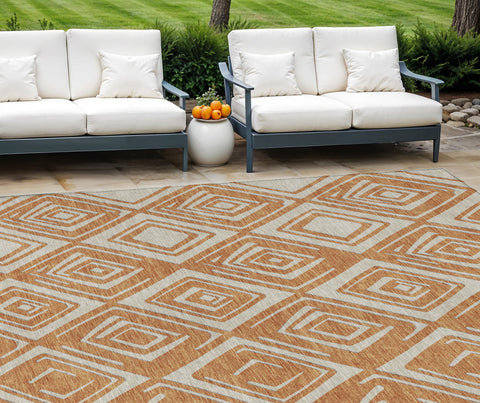 8' X 10' Orange And Ivory Geometric Washable Indoor Outdoor Area Rug