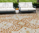 8' X 10' Orange Beige And Gold Floral Washable Indoor Outdoor Area Rug