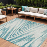 8' X 10' Teal Blue And Ivory Abstract Washable Indoor Outdoor Area Rug