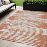 5' X 8' Coral And Ivory Striped Washable Indoor Outdoor Area Rug