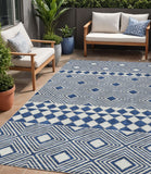 5' X 8' Navy Blue And Ivory Geometric Washable Indoor Outdoor Area Rug