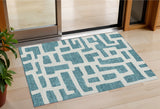3' X 5' Teal Blue And Ivory Abstract Washable Indoor Outdoor Area Rug
