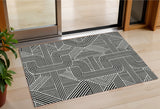 3' X 5' Black And Ivory Abstract Washable Indoor Outdoor Area Rug