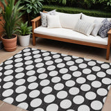 8' X 10' Black And Ivory Polka Dot Washable Indoor Outdoor Area Rug