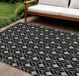 8' X 10' Black And Ivory Geometric Washable Indoor Outdoor Area Rug