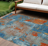 8' X 10' Navy Blue Orange And Ivory Abstract Washable Indoor Outdoor Area Rug