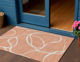 3' X 5' Salmon And Ivory Abstract Washable Indoor Outdoor Area Rug
