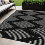 5' X 8' Black And Ivory Geometric Washable Indoor Outdoor Area Rug