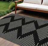 8' X 10' Black And Ivory Geometric Washable Indoor Outdoor Area Rug